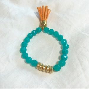 Aqua beaded bracelet with leather tassel